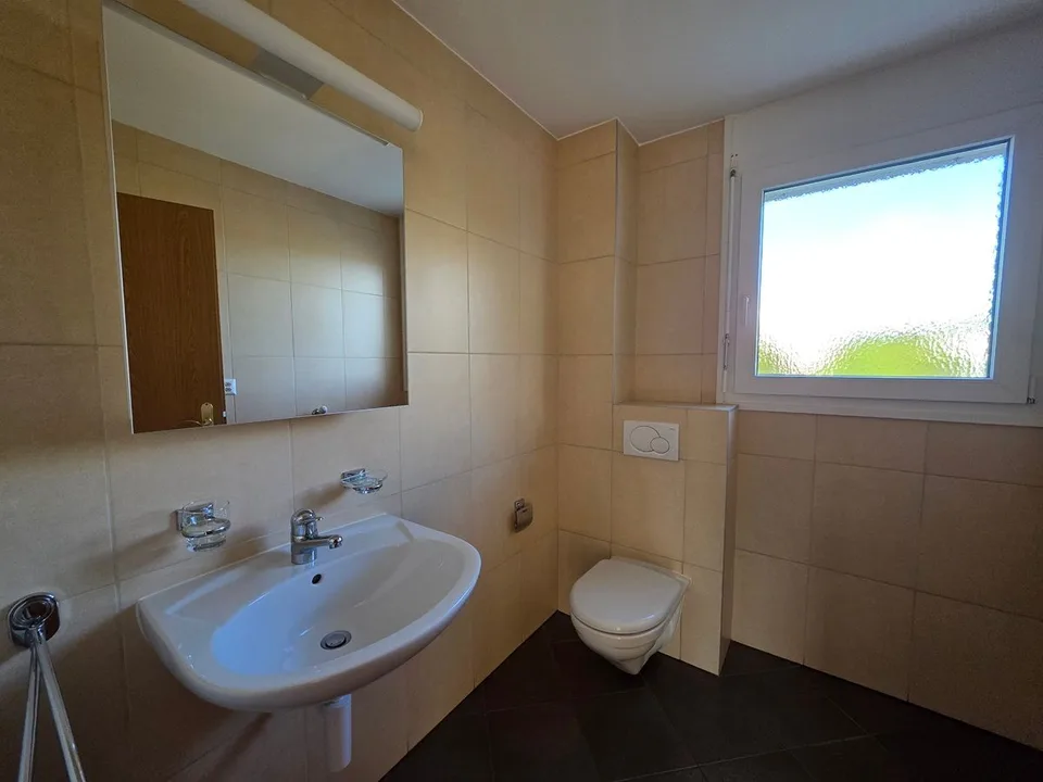 Appartement 5,5 pièces avec terrasse, garage double et place de parc extérieure – photo 10 sur 13