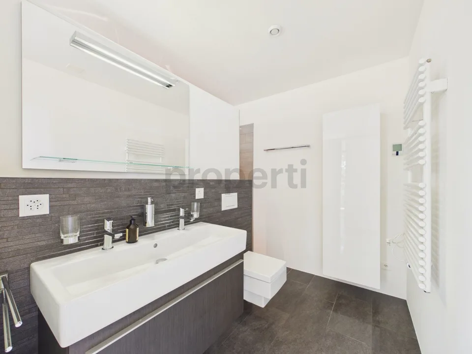 Exclusive spacious 3.5 room apartment with terrace and garden in park-like setting – photo 7 of 22