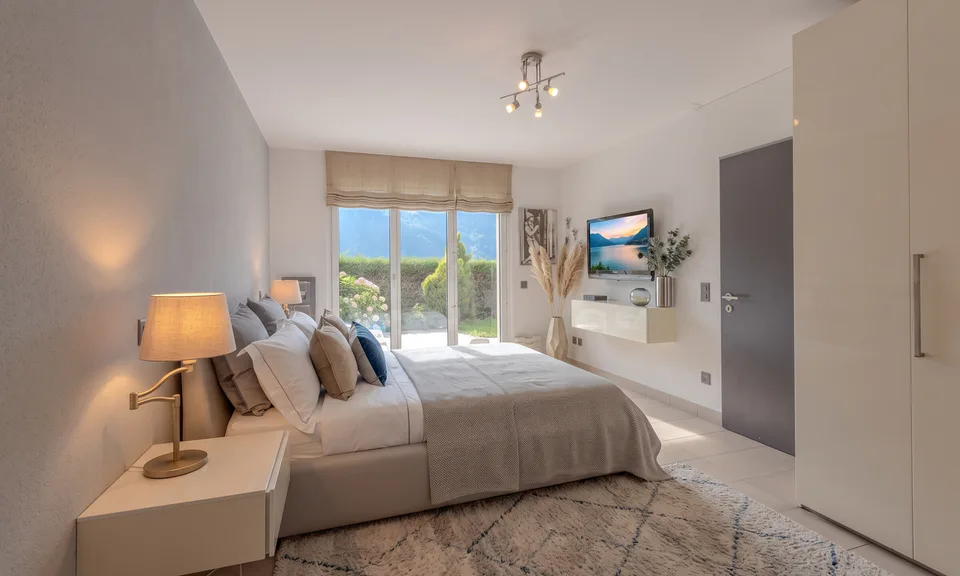 MODERNA CASA 5.5 LOCALI CON VISTA LAGO MOZZAFIATO A CAPOLAGO – foto 7 di 9