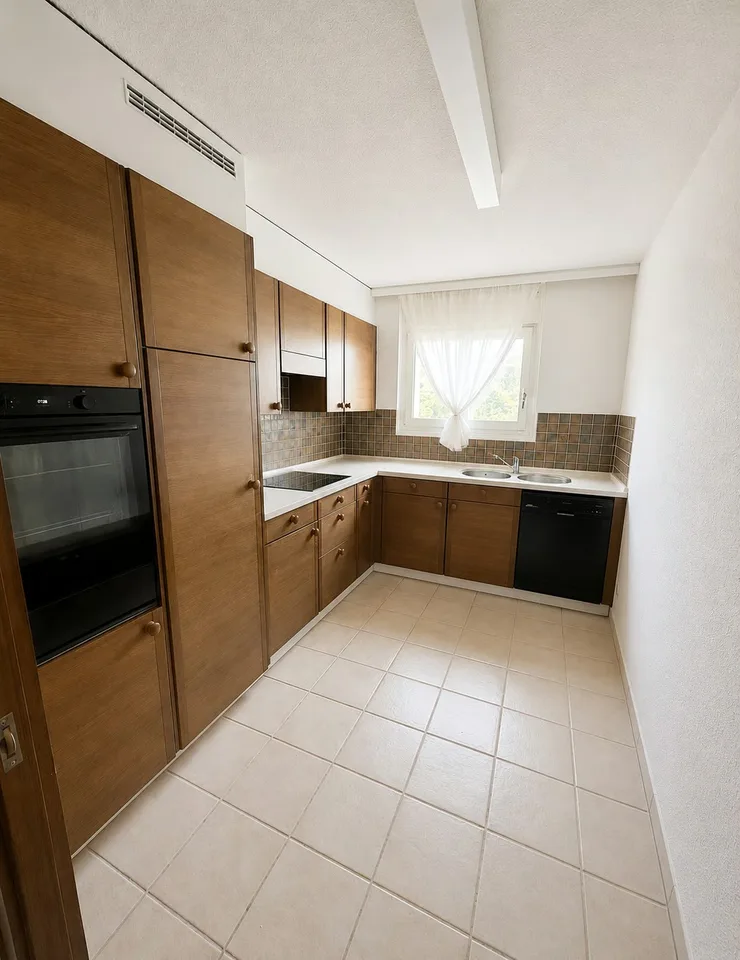 Ampio appartamento di 5,5 locali con camino e grande balcone sud – foto 13 di 13