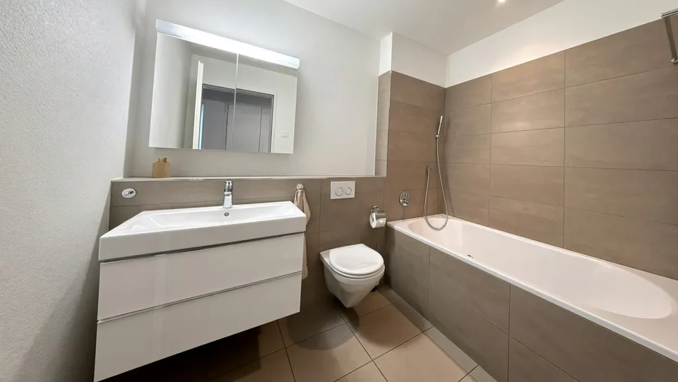 Appartamento giardino attraente di 3½ locali con vista lago – foto 8 di 12