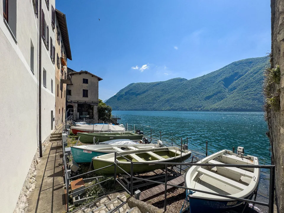 Casa vista lago da ristrutturare con licenza approvata a Gandria – foto 6 di 8