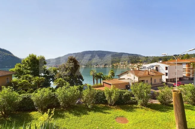 Luminoso 4½ locali con vista lago balcone e terrazza in posizione strategica – Foto 11 von 14