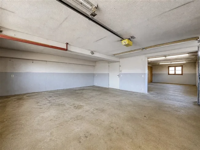 Grande maison avec 2 appartements et vaste garage – photo 11 sur 13