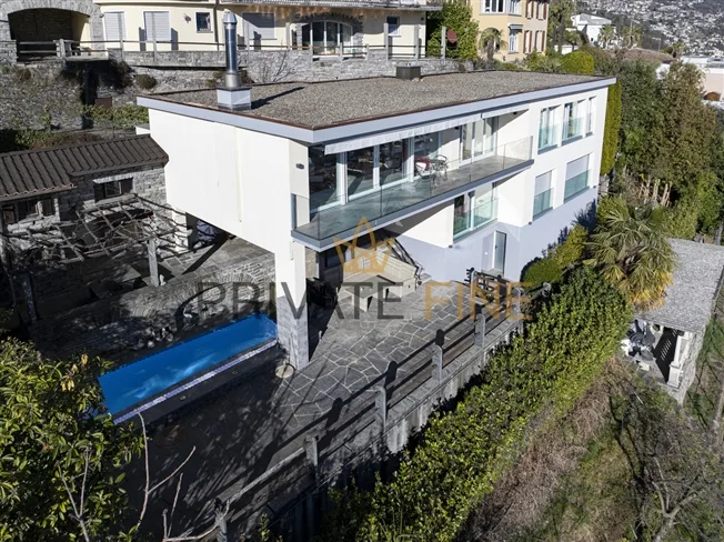 Moderne 5.5 Zi.-Villa mit Pool und Seesicht – foto 9 di 10