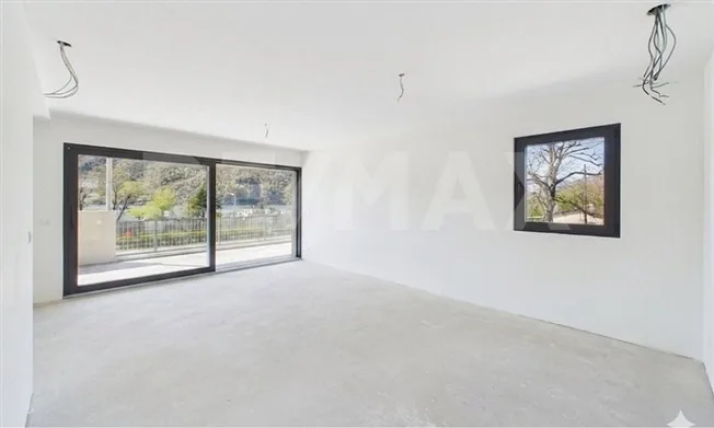 Duplex 3 ½ locali con vista lago e giardino - come una casa a Melano – Foto 12 von 14