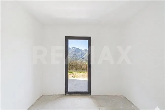Duplex 3 ½ locali con vista lago e giardino - come una casa a Melano – Foto 7 von 14
