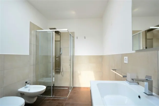 5.5 Zimmer Attikawohnung in Comano – Foto 10 von 12