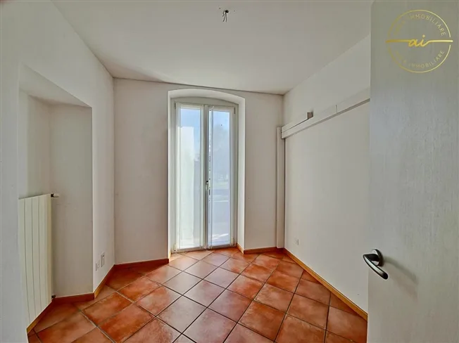 APPARTAMENTO DI 4 LOCALI CON AMPIA TERRAZZA COPERTA A MENDRISIO A REDDITO – foto 11 di 13