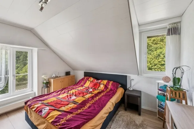 Dachwohnung mit Flair in Bahnhofsnähe