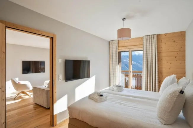 Superbe appartement ski in-out dans résidence hôtelière – photo 4 sur 23