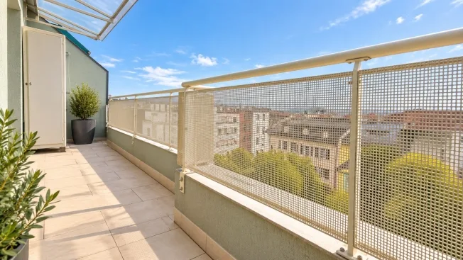 Top floor with panoramic view in the heart of Geneva – photo 2 of 5