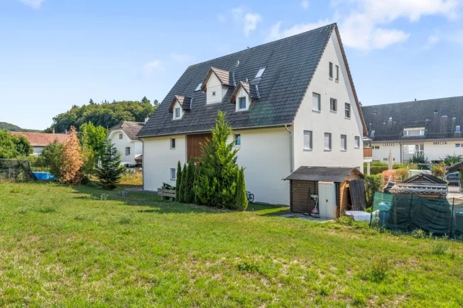 Lichtdurchflutete 4.5-Zimmer-Gartenwohnung mit Lift und Tiefgaragenplatz – Foto 2 von 13