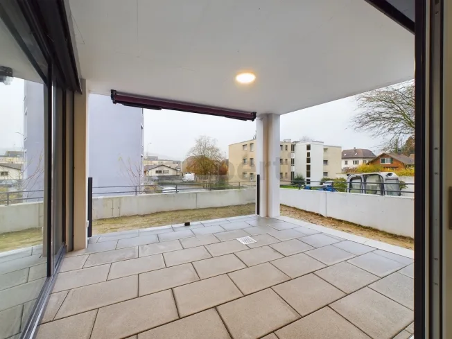 Modern kitchen island, seating area with garden & Minergie standard! – photo 8 of 18