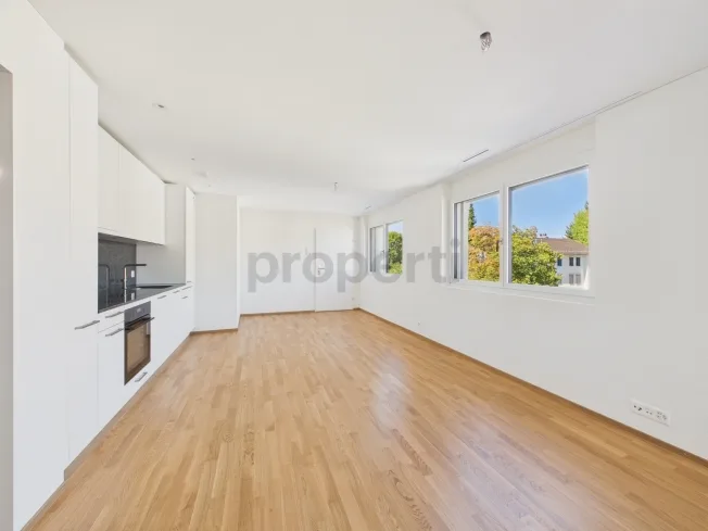 Sonniger Balkon, Minergie-Standard, Lift & Perfekte ÖV-Anbindung! – Foto 1 von 14