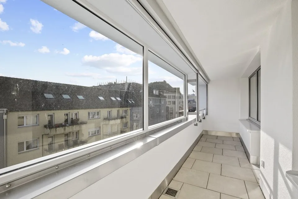 Moderne Wohnung an urbaner Lage und exklusiver Dachterrasse – photo 9 sur 11