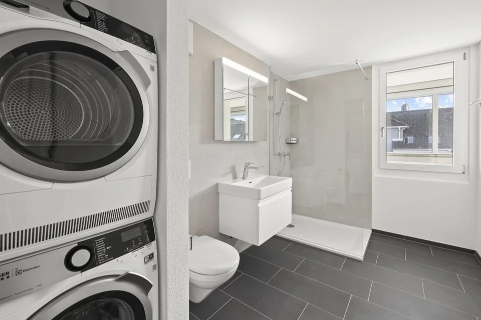 Moderne Wohnung an urbaner Lage und exklusiver Dachterrasse – photo 6 sur 11