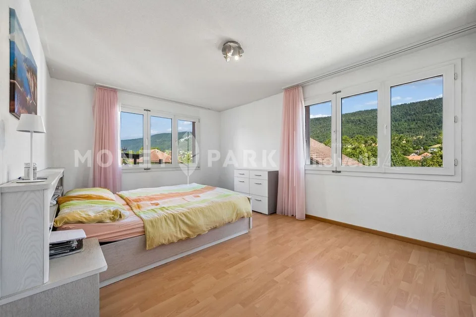 APPARTEMENT FAMILIAL LUMINEUX DE 4.5 PIECES AVEC VÉRANDA ET JARDIN PRIVATIF – photo 4 sur 11