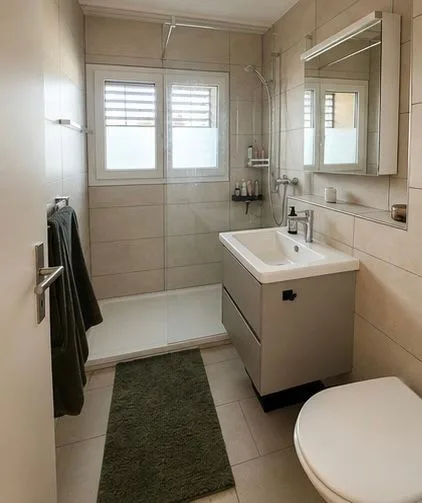 Moderne 2.5-Zimmer-Gartenwohnung mit grosser Terrasse und Parkplatz