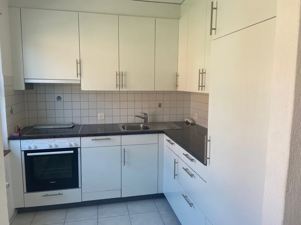 Schöne 3 1/2 Zi.-Wohnung mit Sitzplatz und Balkon