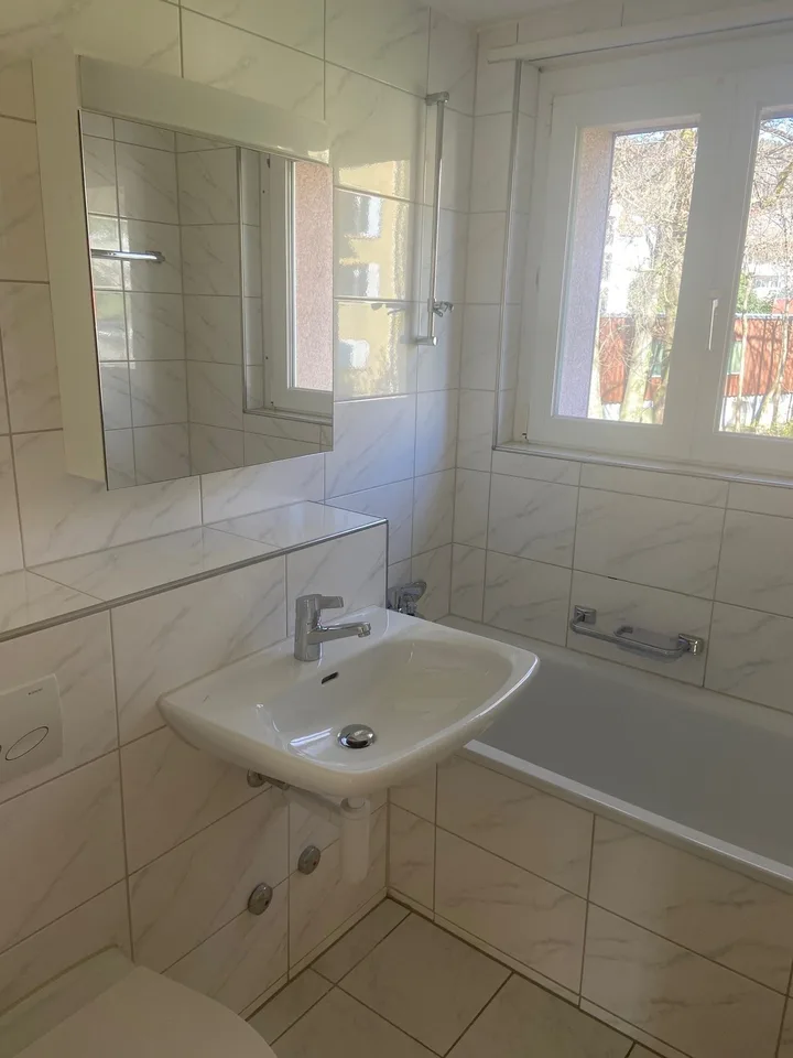 Hübsche 3 Zimmer Hochparterre-Wohnung mit Balkon