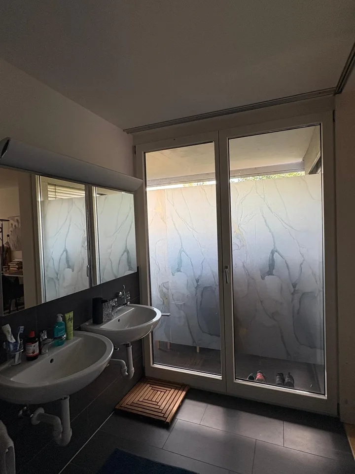 Spacious room with private bathroom in modern apartment