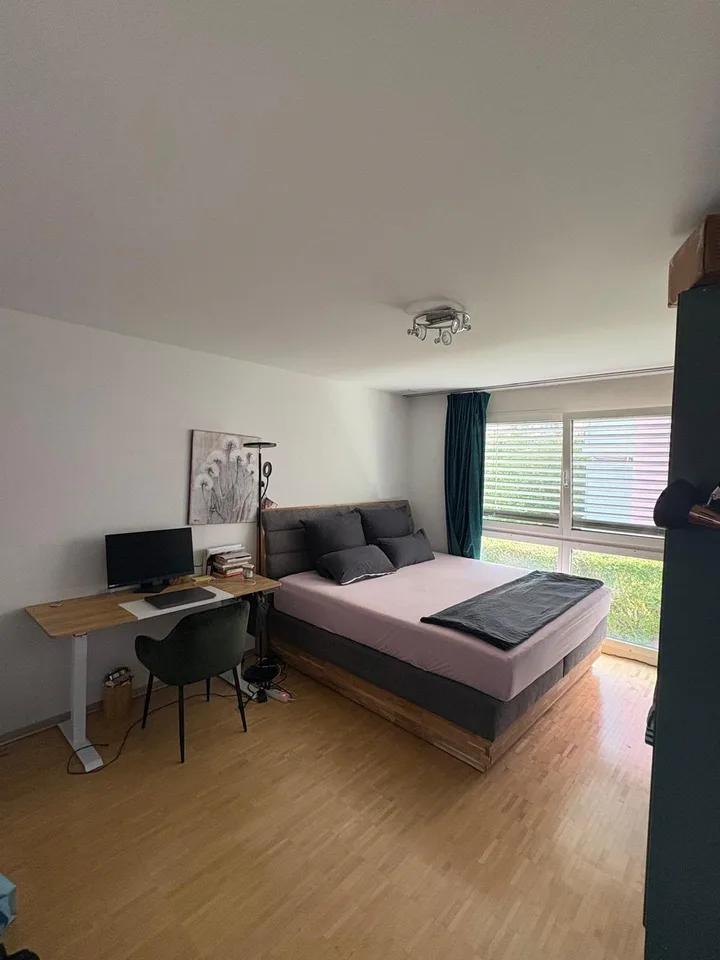 Spacious room with private bathroom in modern apartment