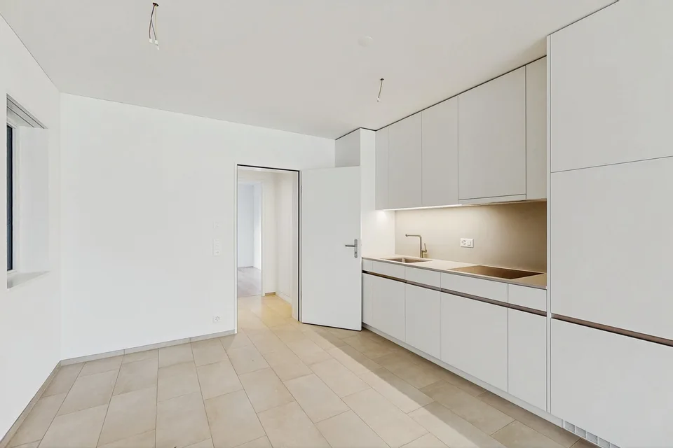 Moderne 2.5-Zimmer-Wohnung mit Mietgarten und Holzterrasse in Zürich-Schwamendingen
