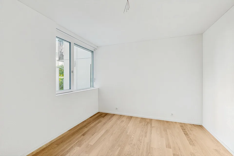 Moderne 2.5-Zimmer-Wohnung mit Mietgarten und Holzterrasse in Zürich-Schwamendingen – photo 10 sur 12