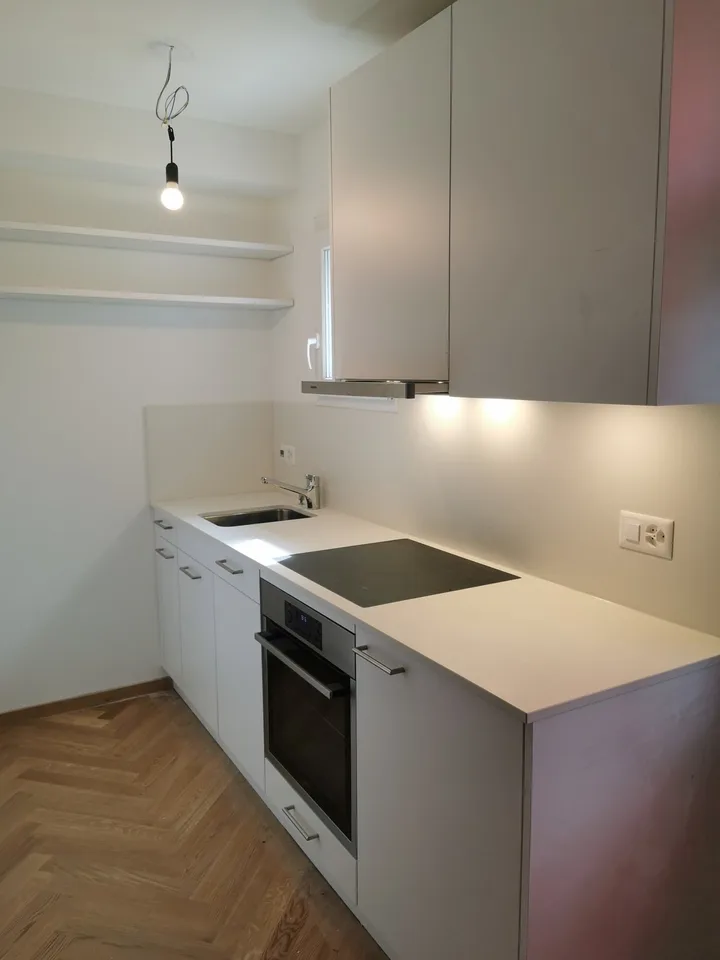 Exklusive 1-Zimmer-Terrassenwohnung mit Privatgarten – Wohnen im Eigentumsstandard in Zürich-Wipkingen