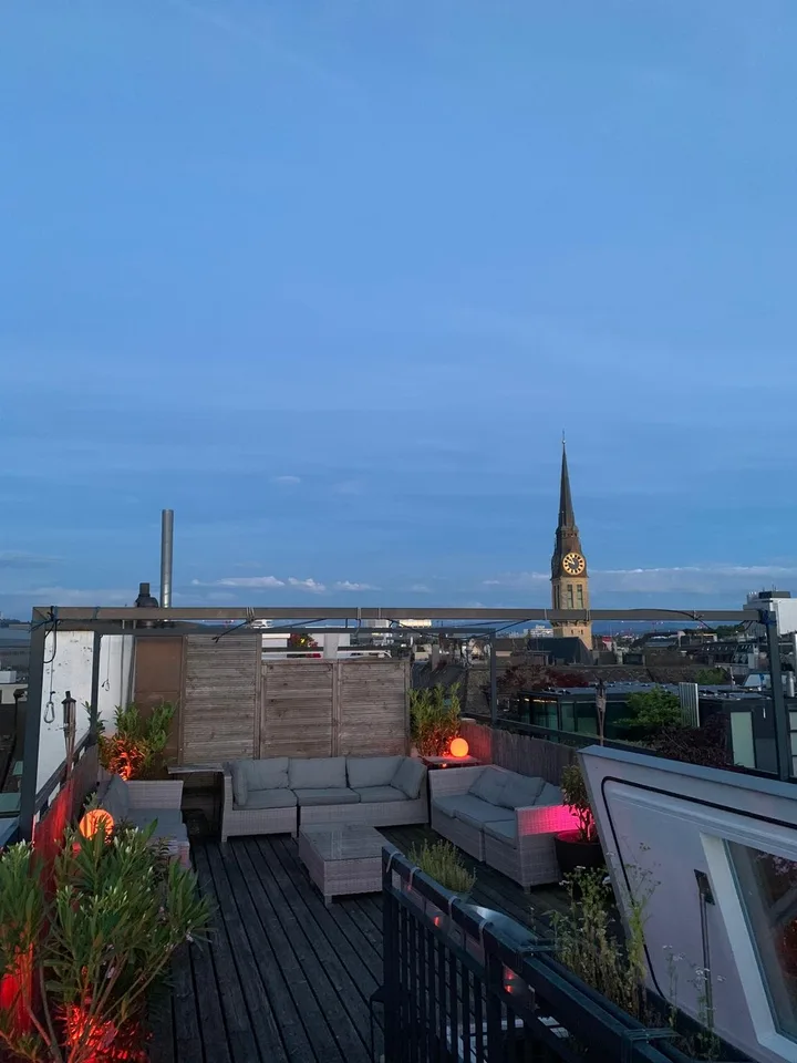 Room in shared penthouse apartment with private rooftop