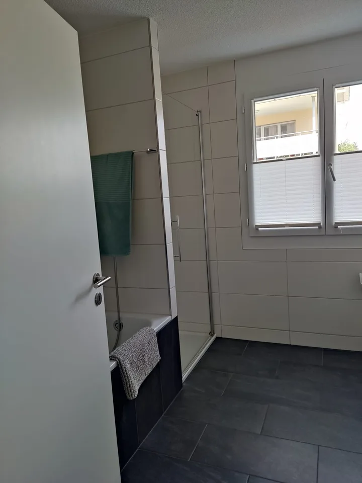 4.5 Zimmer Wohnung im Erdgeschoss mit Gartenanteil