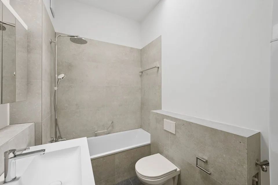 Erstbezug nach Sanierung -  Maisonettewohnung mit Gartensitzplatz