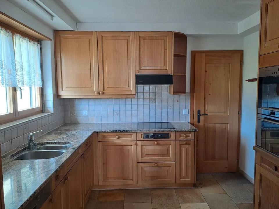 Tolle 4-Zimmerwohnung mit Wintergarten, Garten und Garage