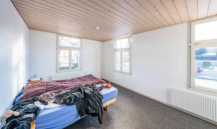 VOLLVERMIETETES MEHRFAMILIENHAUS IN HUTTWIL – photo 7 sur 9