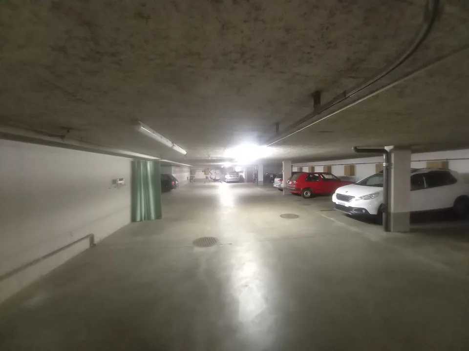 Einstellhallenparkplatz Sandrainquartier