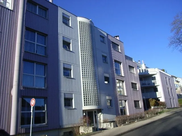 Place de parc intérieure dans garage collectif