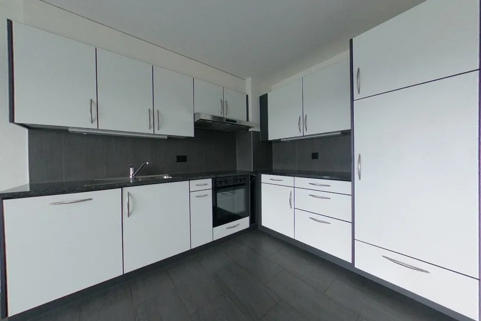 Wohnung mit 4.5 Zimmern im 4. Stock