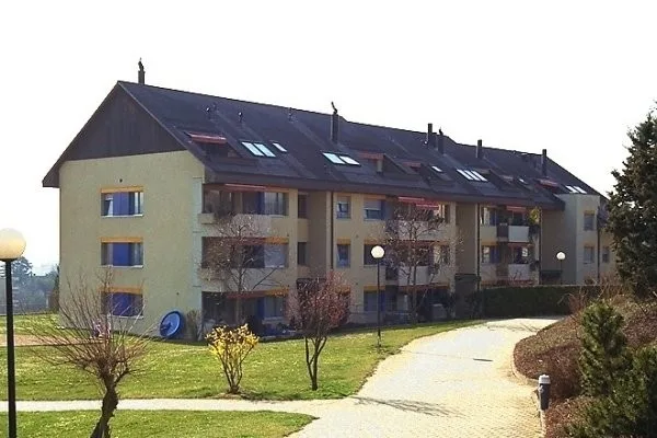 Place de parc intérieure à louer à Bussigny