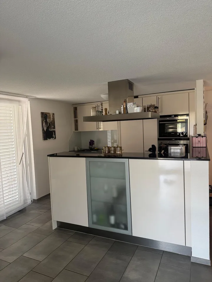Grosszügige 2,5 Zimmer Parterrewohnung mit Terrasse