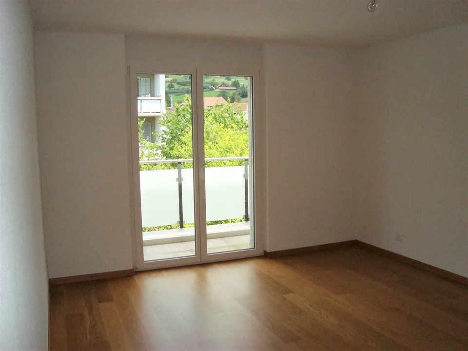Moderne Attikawohnung mit sonniger Terrasse und Blick ins Grüne