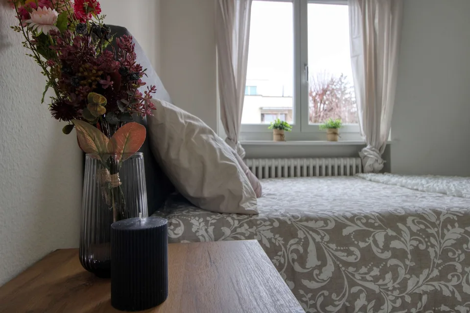 Furnished room in modernised apartment in a top location