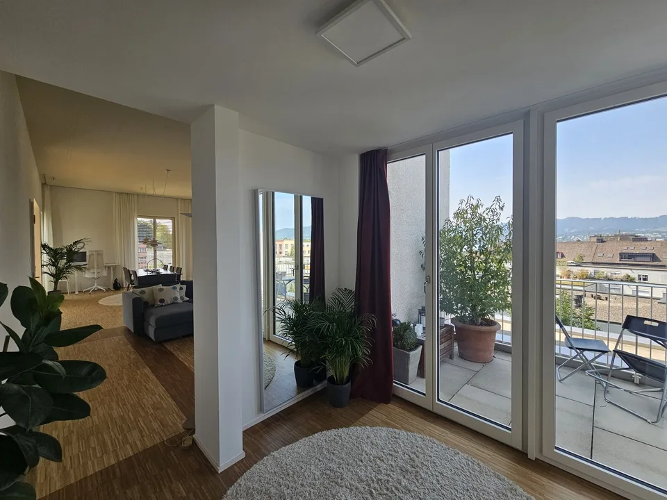 Exklusive 2,5-Zimmer-Attikawohnung mit See- und Alpenblick in Zürich