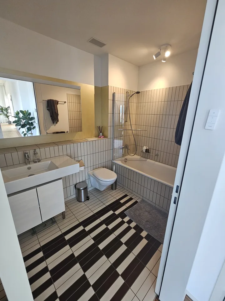Exklusive 2,5-Zimmer-Attikawohnung mit See- und Alpenblick in Zürich