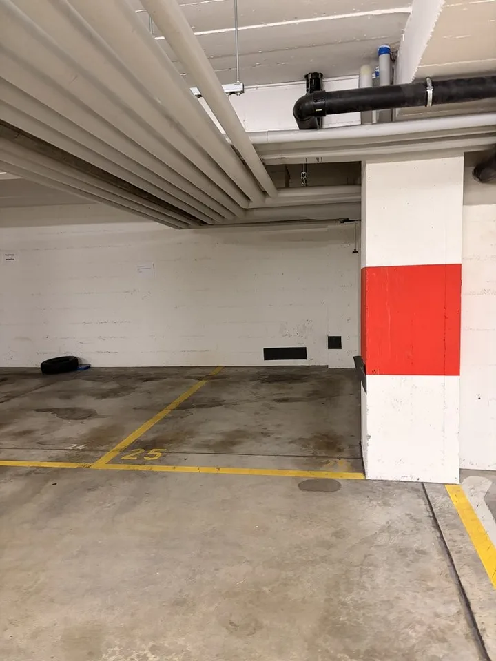 Place de parc dans parking souterrain - Centre Ville