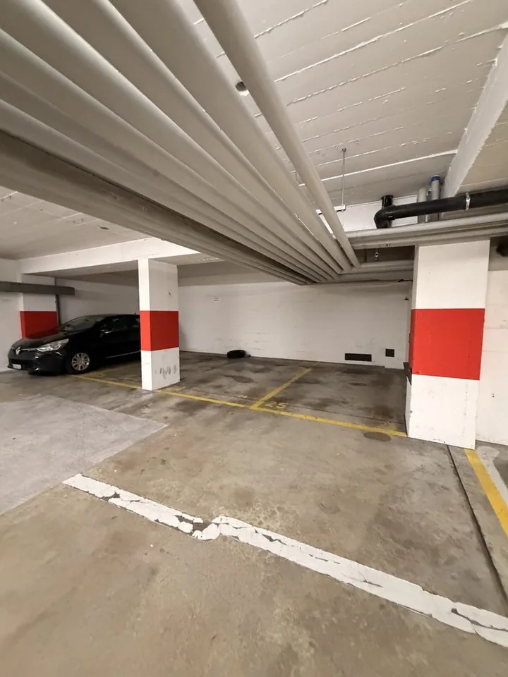 Place de parc dans parking souterrain - Centre Ville