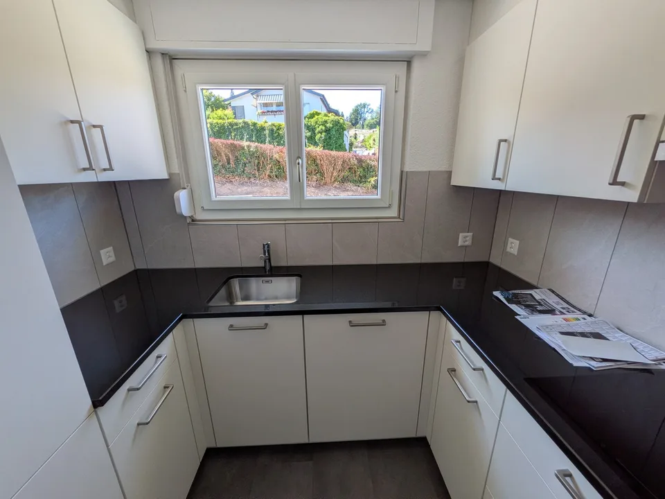 Grosszügige 5.5-Zimmerwohnung mit Garten in Einfamilienhaus
