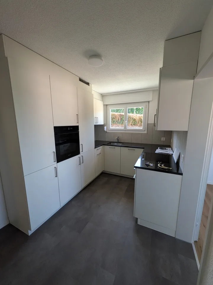 Grosszügige 5.5-Zimmerwohnung mit Garten in Einfamilienhaus