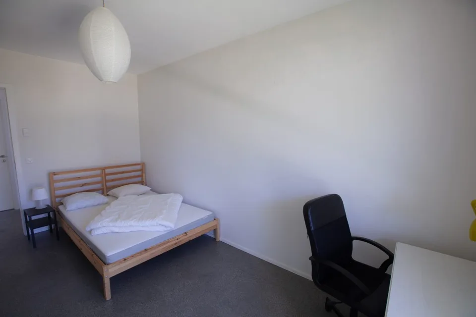 Grande chambre dans une super coloc au nord de Lausanne