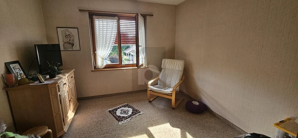 DANS UN QUARTIER RÉSIDENTIEL AU CALME